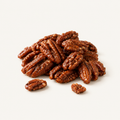 Candied Pecans, styled as a small pile on warm ivory
