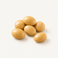 Chai Almonds, styled as a small pile on warm ivory