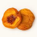 Dried Peaches, styled as a small pile on warm ivory