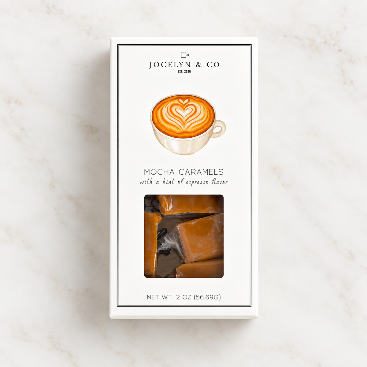 Jocelyn & Co. Mocha Caramels box, centered on pale marble with individually wrapped caramels visible through the window