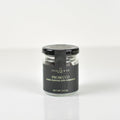 Jocelyn & Co. Prosecco Cordials, in a black-lidded jar against a light background