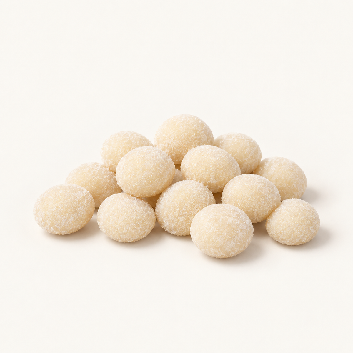 Ivory Sugar Cookies in a small pile on warm ivory