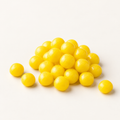 Lemon Sours in a small pile on warm ivory