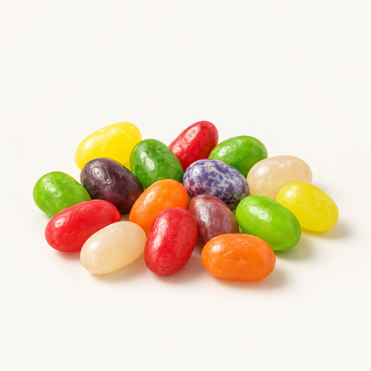 Mixed jelly beans arranged on warm ivory