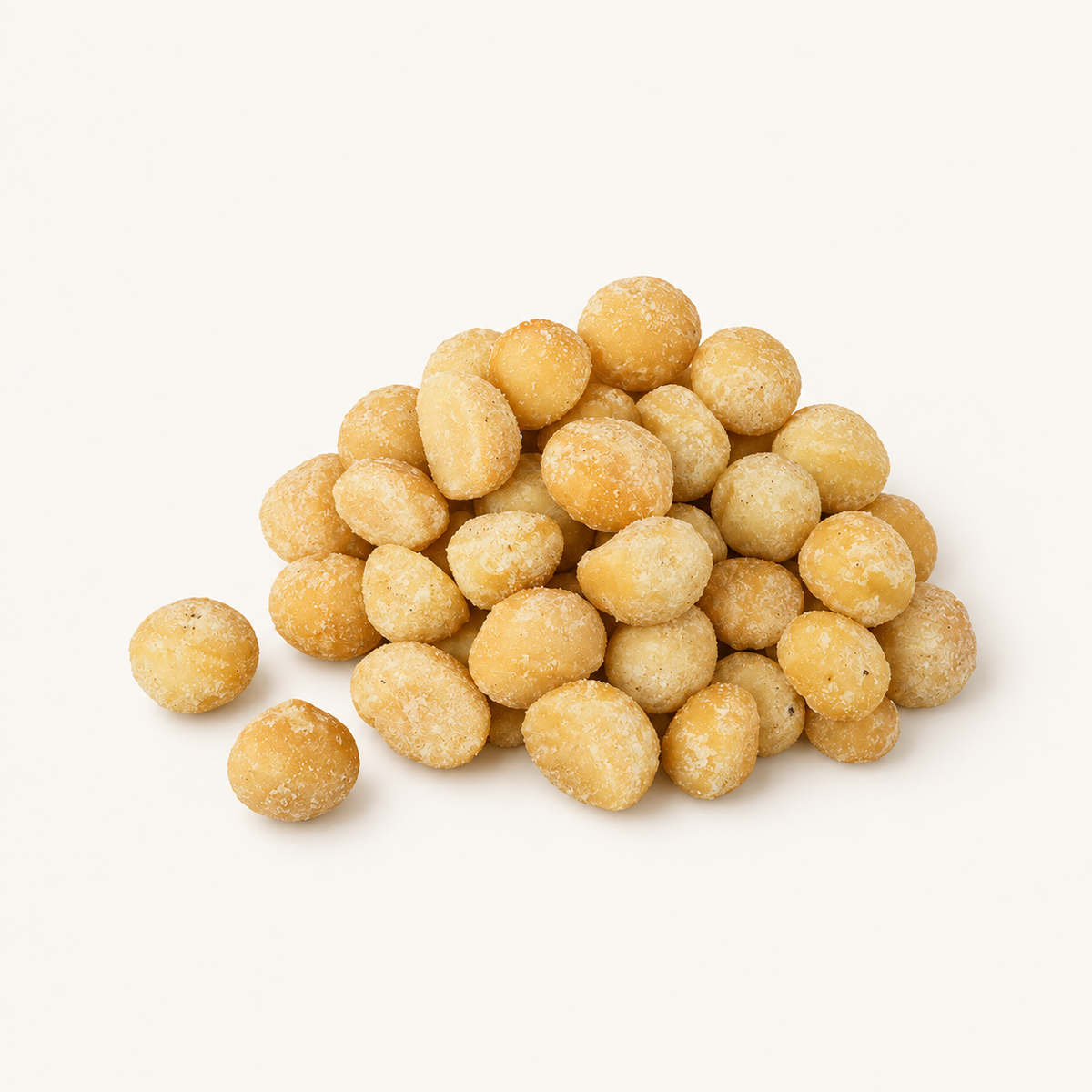 Macadamias, Dry Roasted and Salted, styled as a small pile on warm ivory