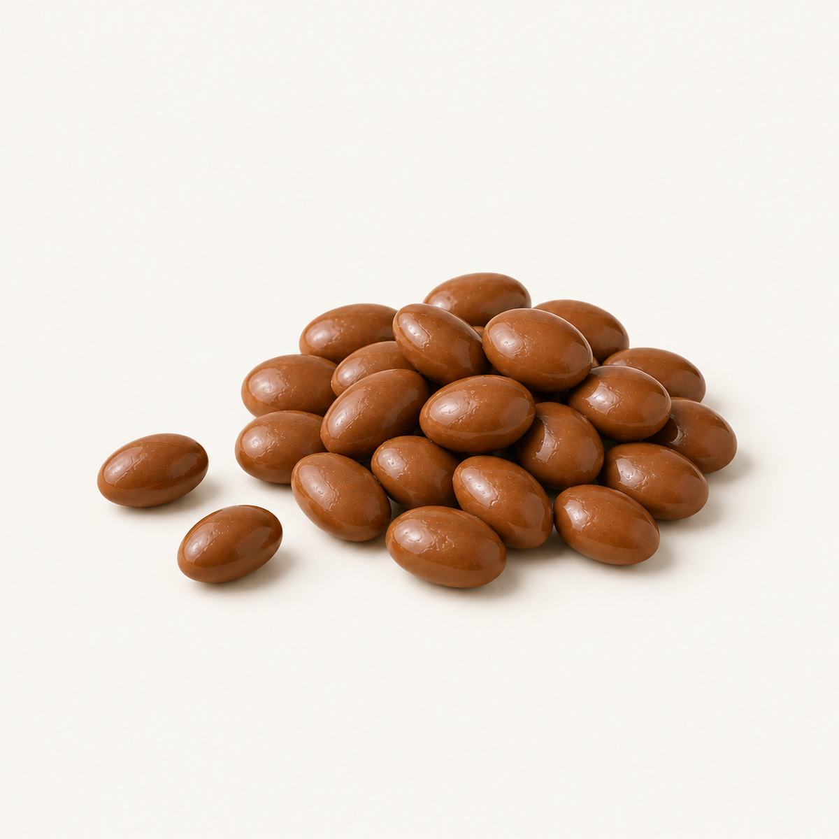 Milk Chocolate Almonds, styled as a small pile on warm ivory