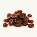 Organic Raisins, styled as a small pile on warm ivory