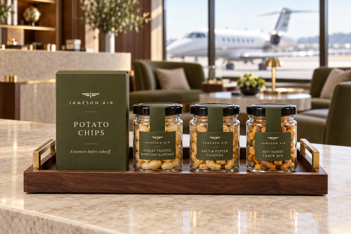 Jameson Air concept: coordinated snack packaging on a walnut tray in an FBO lounge